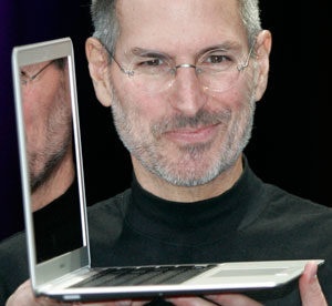 Steve Jobs Showing MacBook Air